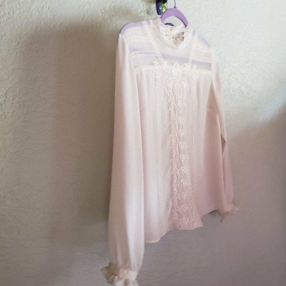 Sheer lace blouse